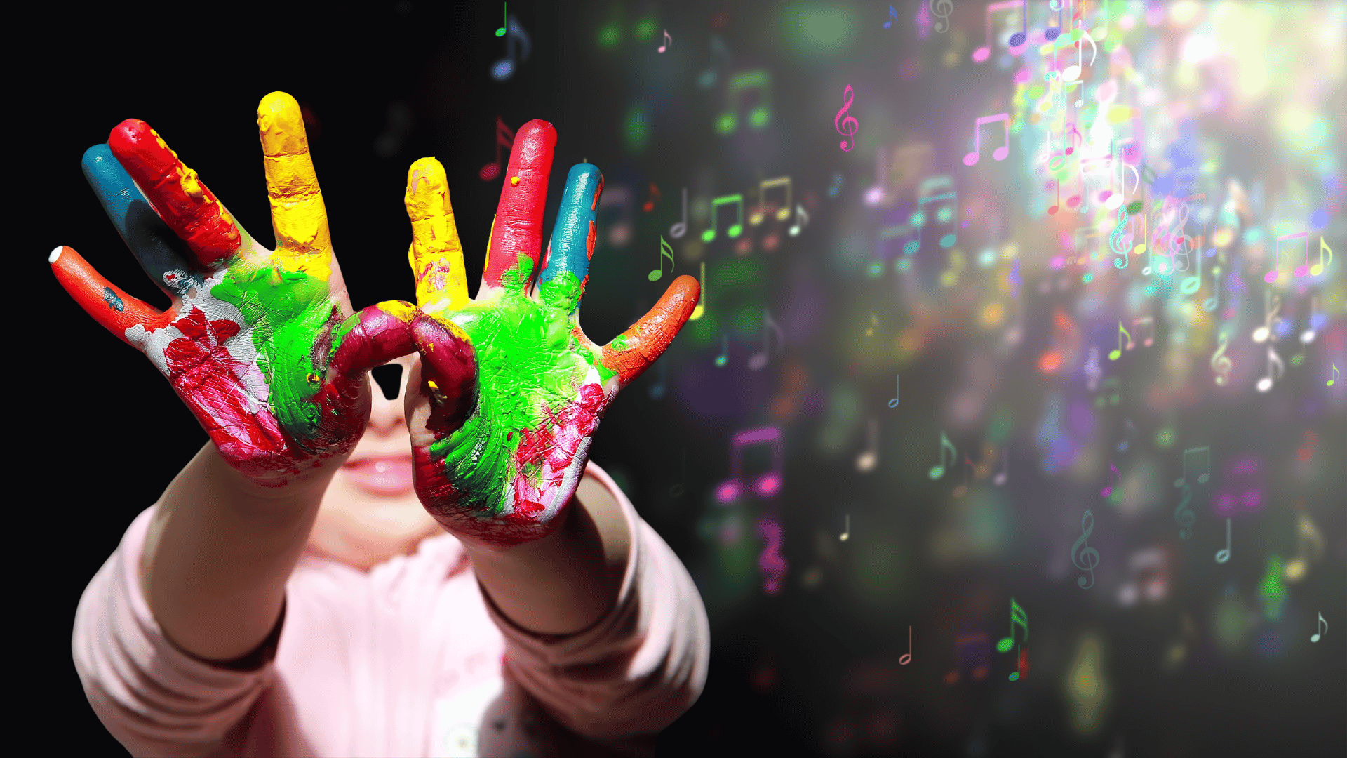 A child holding her colorfully painted hands towards the camera against a background of musical notes that appear to fly into a light