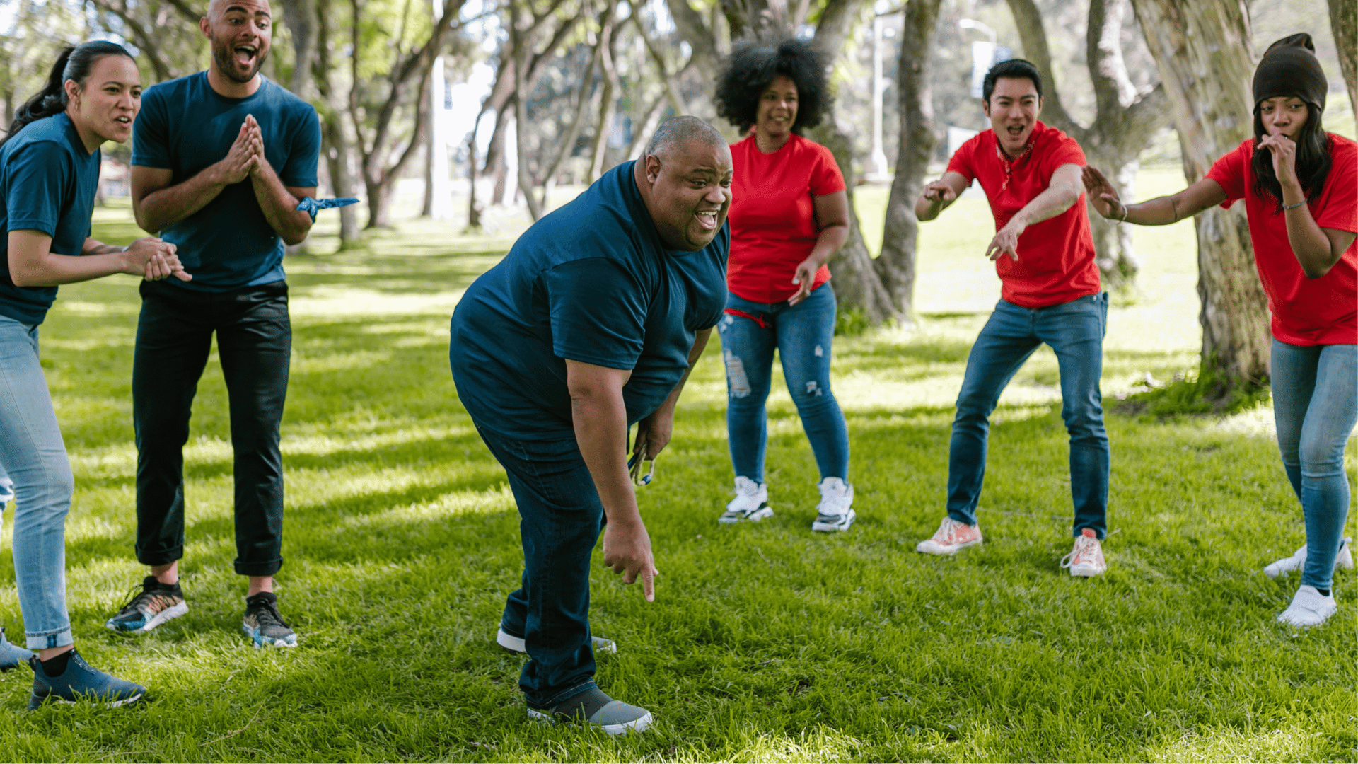 Adults having fun playing a game outdoors